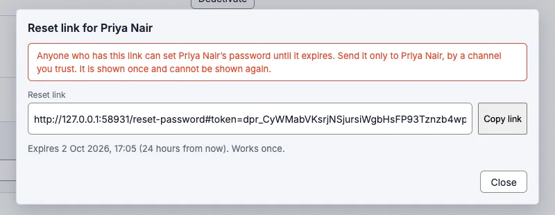 A dialog titled Reset link for Priya Nair with a red warning that anyone with the link can set the password until it expires, the link in a read-only field with a Copy link button, and the line Expires 2 Oct 2026, 17:05 (24 hours from now). Works once.